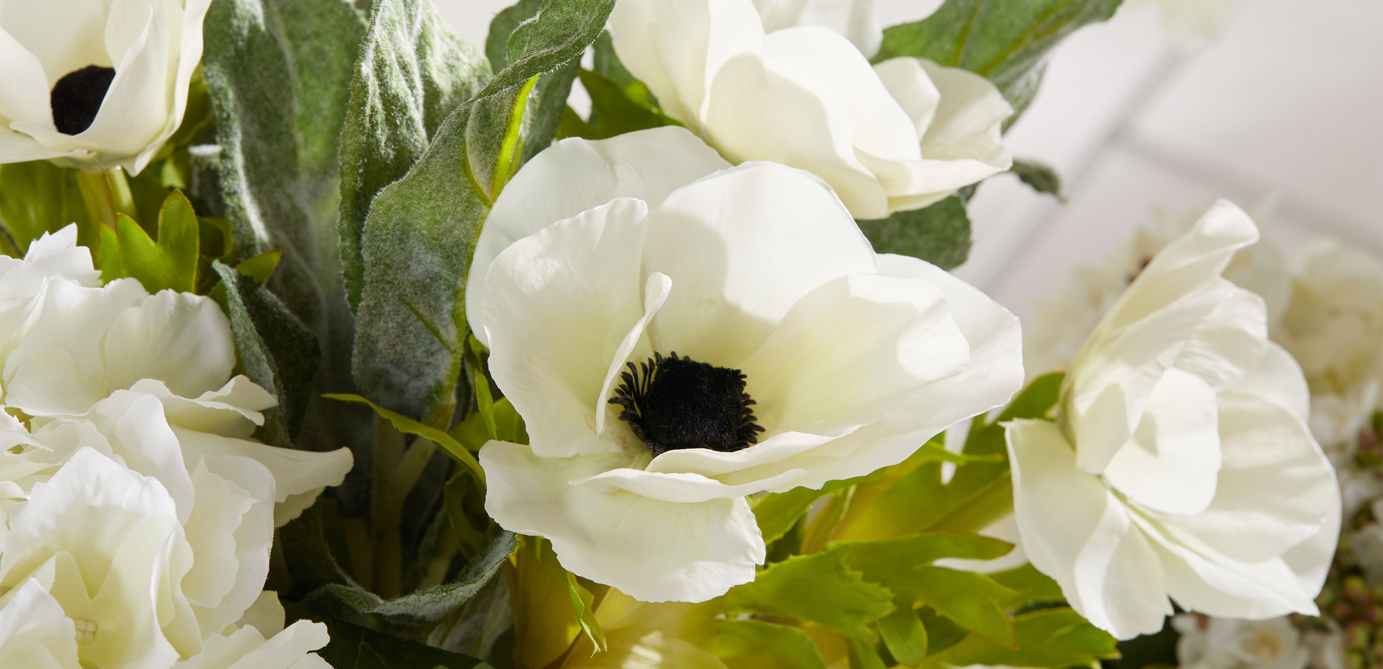 White Mixed Floral Centerpiece in Oval Vase_3