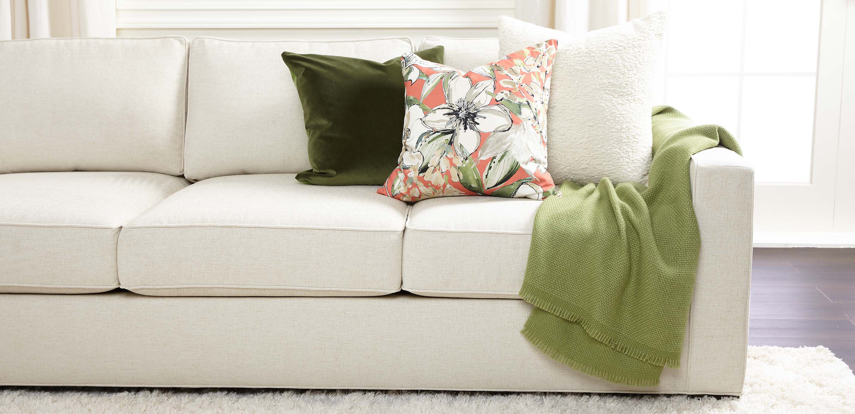 Coral and 2025 green throw pillows