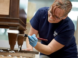 employee gilding furniture