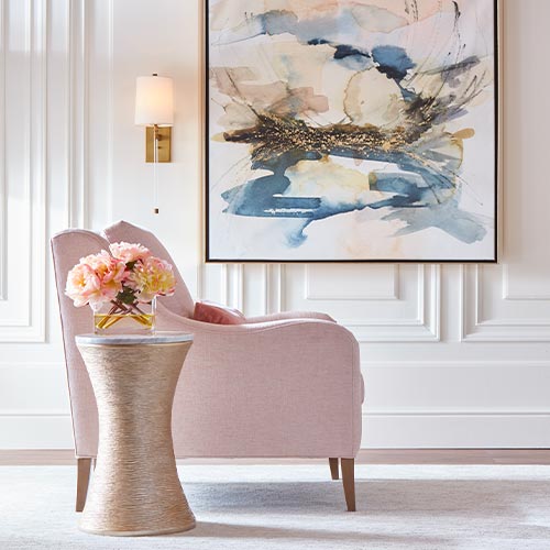 pink chair with blue abstract artwork