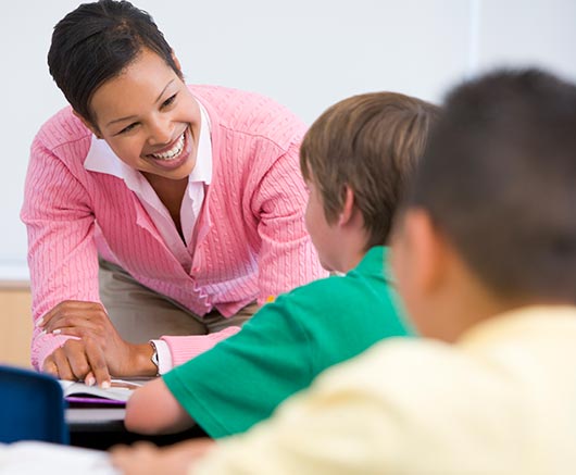 young teacher with students